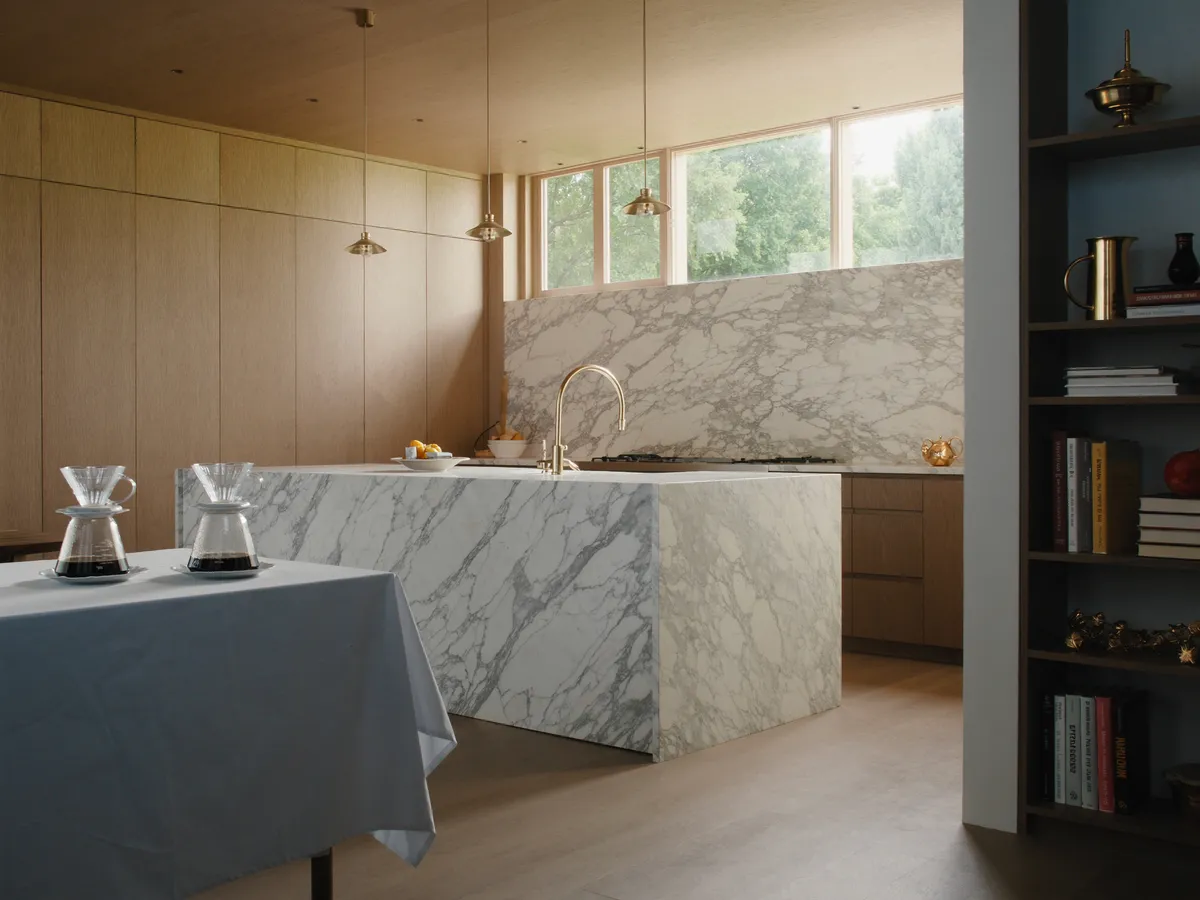 Full home renovation in Rosedale, Toronto — bespoke kitchen with marble waterfall island and rift-oak cabinetry